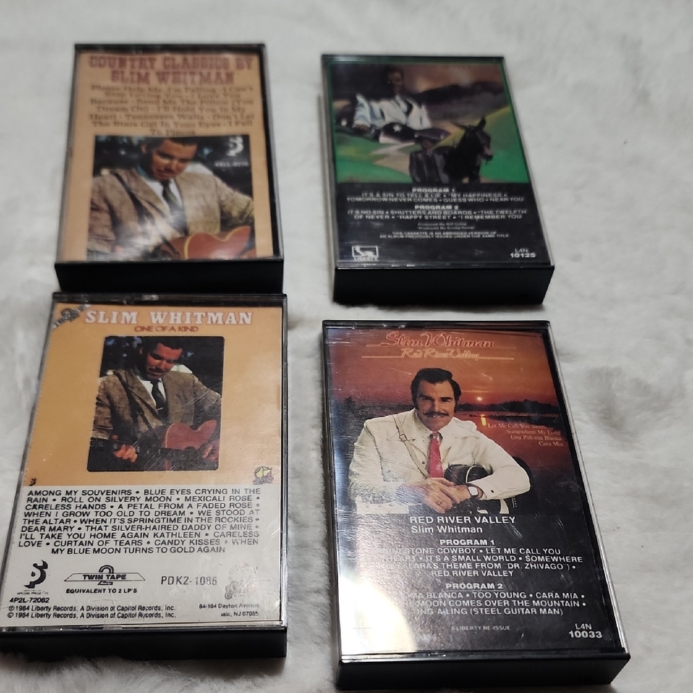 SLIM WHITMAN   ( 4 - CASSETTES ) . NON TESTED.